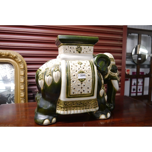 2090 - An Oriental green ceramic elephant garden seat