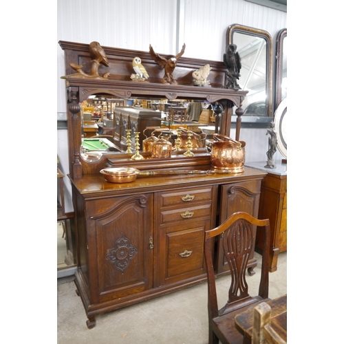 2112 - A 1930s Oak mirror backed sideboard