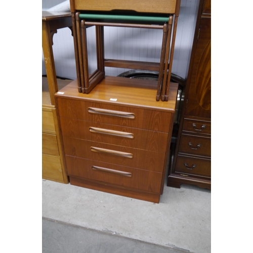 2420 - A teak chest of four drawers, with teak nest of three