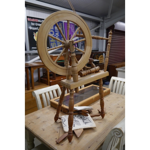 2430 - A spinning wheel and accessories