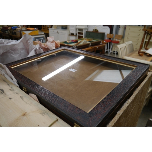 2445 - A dark carved wooden display case