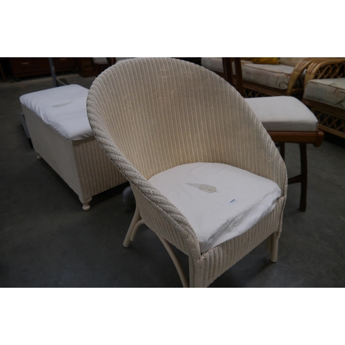 2449 - A Lloyd Loom chair and ottoman