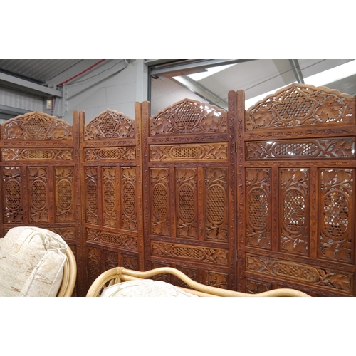 2454 - A hardwood Indian four fold screen