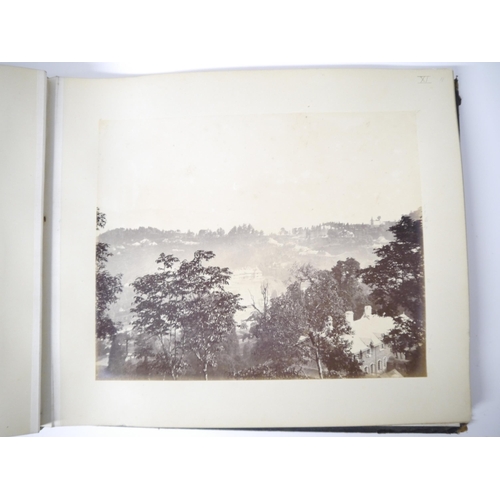 5299 - A photograph album circa 1884 containing approx. 30 albumen print photographs of India, mainly Darje... 