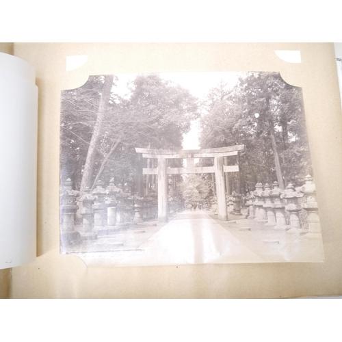 5276 - (Japan.) An album containing 75+ albumen print views of Japan c.1890-1900, of which 30 hand tinted, ... 