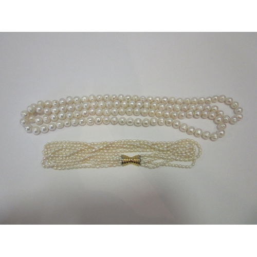 1372 - A multi-strand freshwater pearl necklace and large cultured pearl necklace