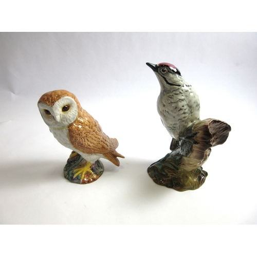 6021 - A Beswick Lesser Spotted Woodpecker in gloss, model no. 2420, together with a Beswick Owl in gloss m... 