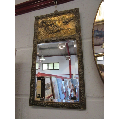 1028 - A brass and bevelled mirror hall plaque embossed with hunting scene, 41cm x 22cm total