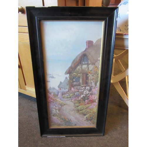 1030 - A framed print of cottage scene and a gilt framed oil seascape