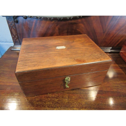 1072 - A Victorian rosewood vanity box, fitted interior, mother-of-pearl cartouche and escutcheon