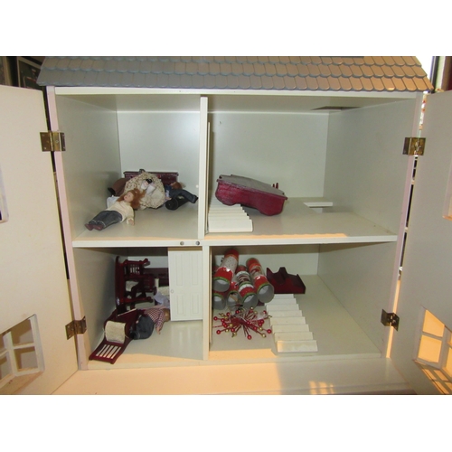 1119 - A Dolls house, with some furniture, 60cm tall x 52cm wide x 36cm deep