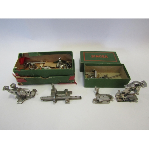 1281 - Two small Singer boxes containing sewing machine accessories