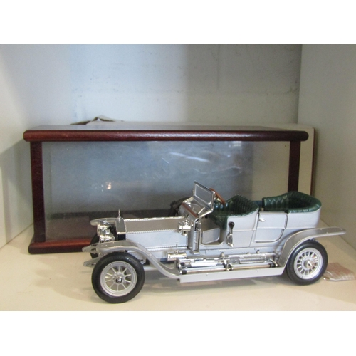 1398 - A Franklin Mint Rolls Royce Silver Ghost model with paperwork. With handmade display box