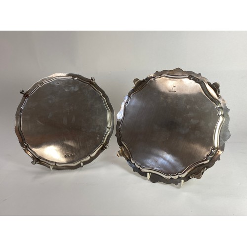 7011 - Two silver salvers: Barker brothers Birmingham 1937, 25.5cm diameter. Walker and Hall, Sheffield 196... 