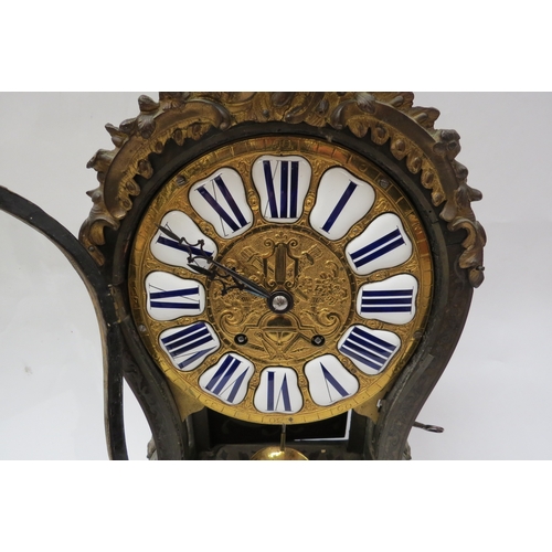 8058 - A 19th Century French bracket clock of balloon form with decorative ormolu mounts. Brass dial with e... 