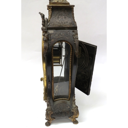 8058 - A 19th Century French bracket clock of balloon form with decorative ormolu mounts. Brass dial with e... 