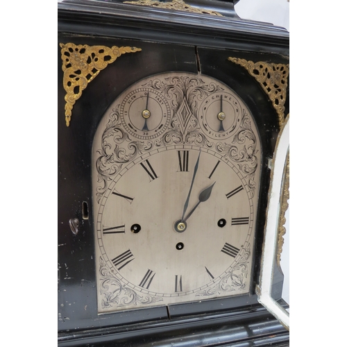 8056 - A 19th Century ebonised bracket clock of large proportions, silvered arched dial with Roman numerals... 