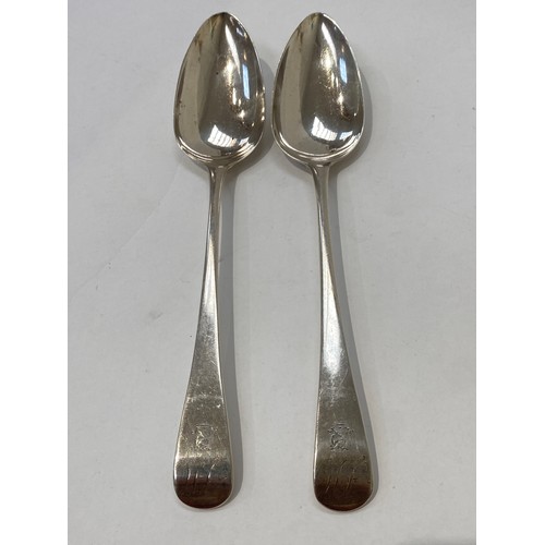 7106 - A pair of Peter and William Bateman silver serving spoons with monogram and crest to terminal, Londo... 