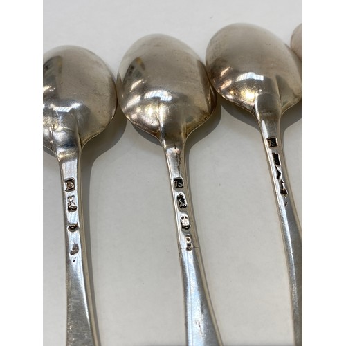 7095 - Six Georgian silver old English pattern spoons all with faded animal crest to terminals one with rep... 