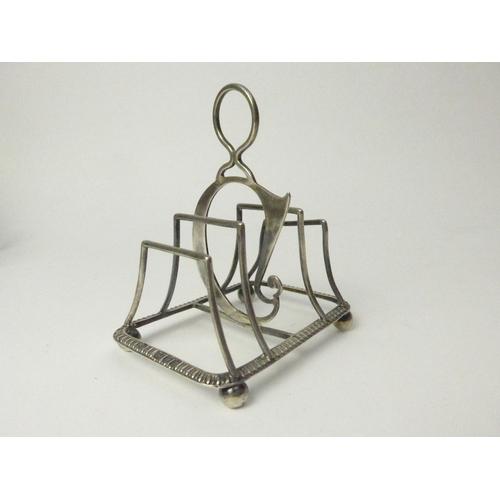 7133 - A William Hutton & Sons Ltd unusual silver toast rack with possible repair, 8cm long, London 1898, 5... 