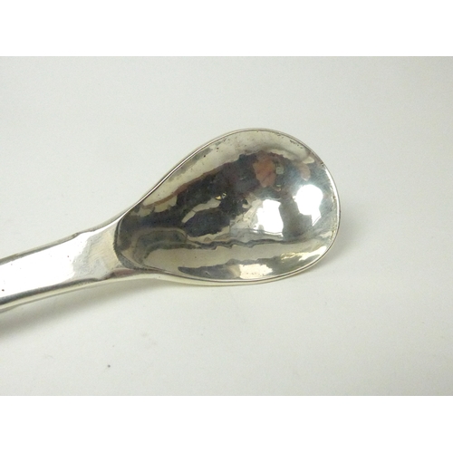 7023 - A Guild of Handicrafts hammered spoon with hanger to back, 18.6cm long, London 1964, 75g