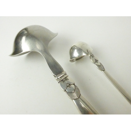 7019 - Two Georg Jensen Danish Sterling silver ladles, 19cm and 13cm long, 94g