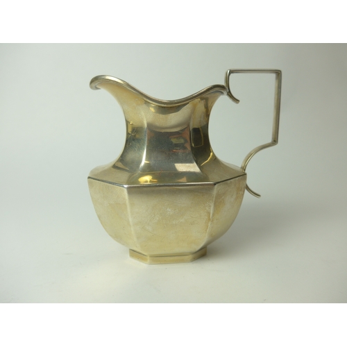 7151 - A William Adams Ltd silver tall cream jug with bulbous body, 11cm tall, 206g