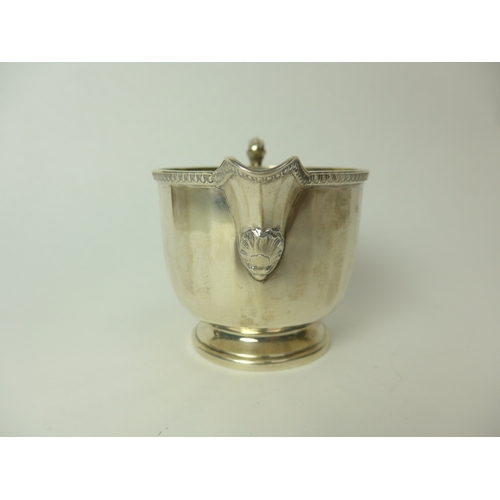 7148 - An Adie Brothers Ltd silver cream jug of Deco form, 7.5cm tall, Birmingham 1927, 129g