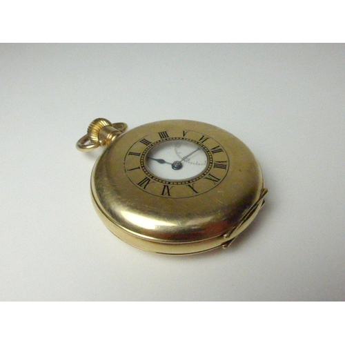 7036 - A gold plated half-hunter pocket watch with Dennison case