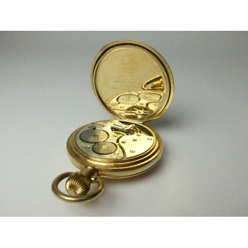 7036 - A gold plated half-hunter pocket watch with Dennison case