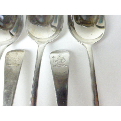 7119 - Eleven William Eley I & William Fearn dessert spoons with crest depicting a torso of a man holding a... 