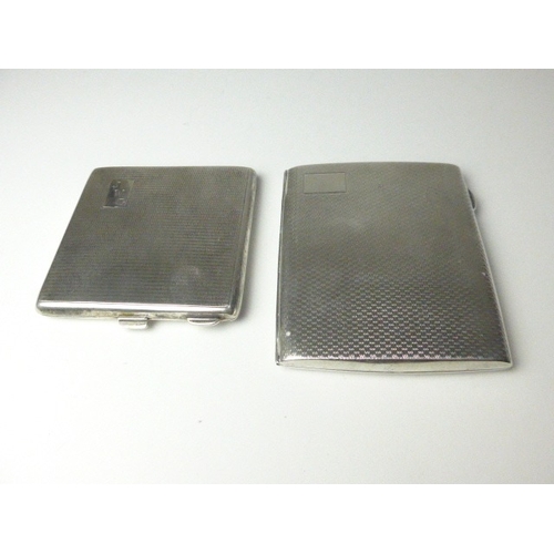 7113 - A silver monogrammed mirrored compact and cigarette case, both engine-turned, 7cm tall and 8.6cm tal... 