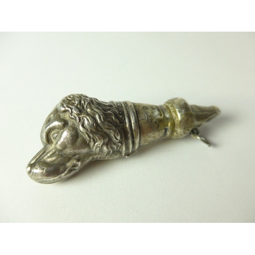 7116 - A silver plated purse, seal stamp marked 800 and a silver whistle in the form of a dog's head, Birmi... 