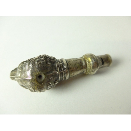 7116 - A silver plated purse, seal stamp marked 800 and a silver whistle in the form of a dog's head, Birmi... 