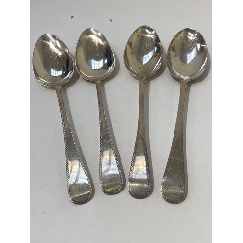 7098 - Two pairs of silver bright-cut serving spoons including John Lambe, London 1804, the other pair dati... 