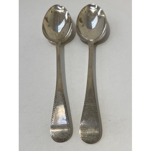 7098 - Two pairs of silver bright-cut serving spoons including John Lambe, London 1804, the other pair dati... 