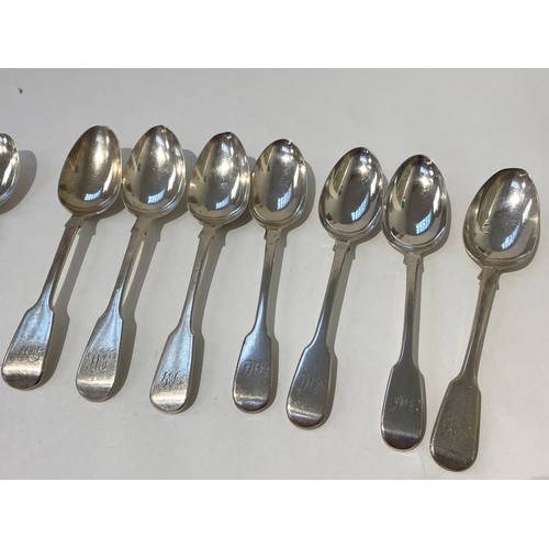 7159 - Thirteen silver fiddle pattern dessert spoons various makers dates and assay marks. Georgian to earl... 