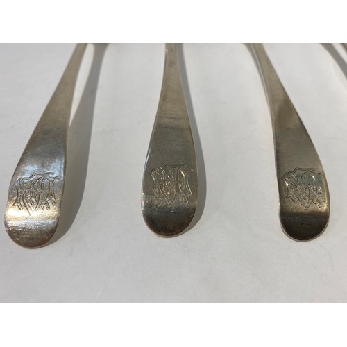 7166 - Four Hester Bateman Old English pattern serving spoons with monogrammed handles, London 1784, 276g