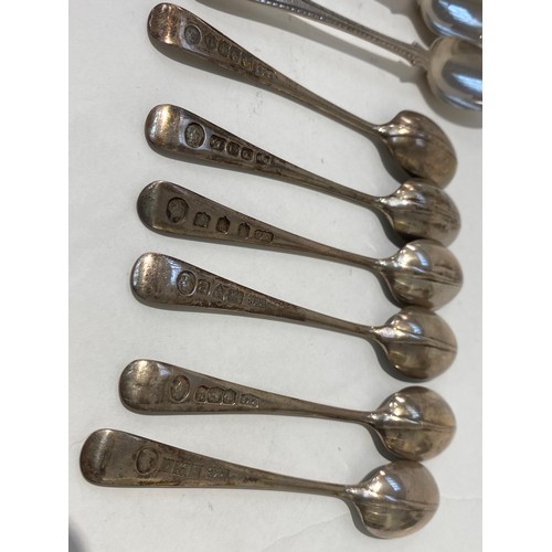 7165 - A set of six Robert and Belks Elizabeth II coronation coffee spoons and a set of six silver teaspoon... 