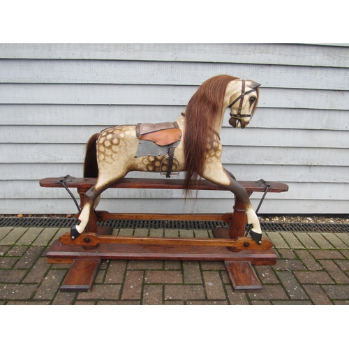 9204 - A late 19th Century crafted FH Ayres carved wood and painted gesso rocking horse, with large fixed g... 