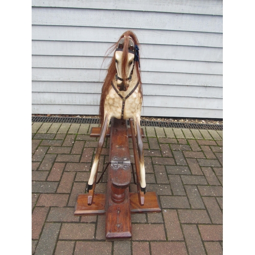 9204 - A late 19th Century crafted FH Ayres carved wood and painted gesso rocking horse, with large fixed g... 