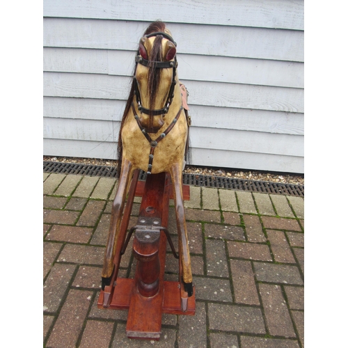 9200 - An early 20th Century crafted FH Ayres carved wood and painted gesso nursery size rocking horse, wit... 