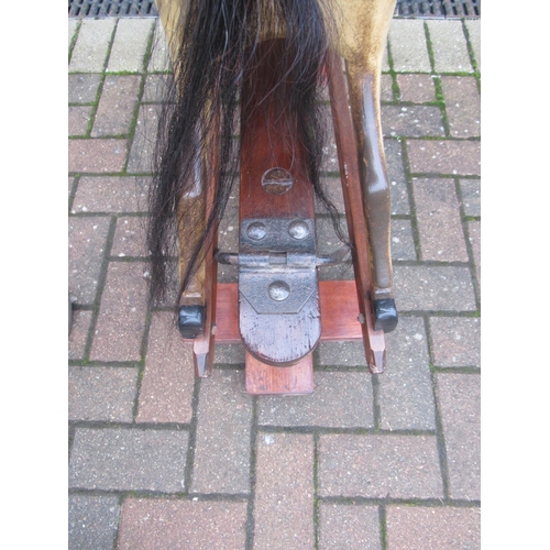 9200 - An early 20th Century crafted FH Ayres carved wood and painted gesso nursery size rocking horse, wit... 