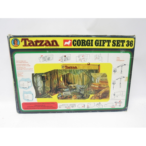 9430 - A boxed Corgi Toys Tarzan Gift Set 36, comprising Jungle Land Rover and animal trailer, dinghy on tr... 