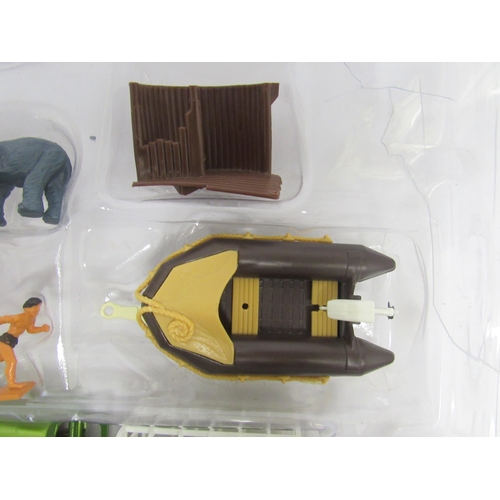 9430 - A boxed Corgi Toys Tarzan Gift Set 36, comprising Jungle Land Rover and animal trailer, dinghy on tr... 