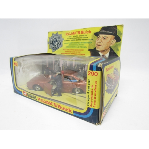 9432 - A Corgi diecast 290 Kojack's Buick in metallic copper with white interior, with two plastic figures ... 