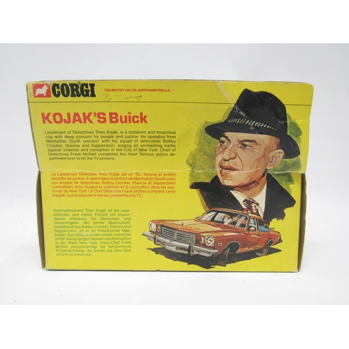 9432 - A Corgi diecast 290 Kojack's Buick in metallic copper with white interior, with two plastic figures ... 