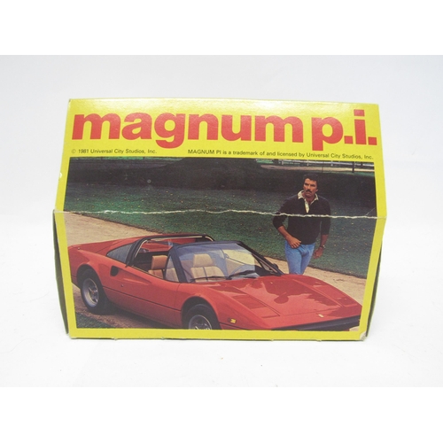 9436 - A Corgi diecast 298 Magnum PI Ferrari 308GTS in red with black interior, beige seats and chrome four... 