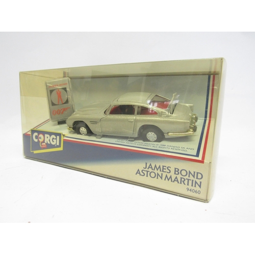 9418 - Four boxed Corgi diecast James Bond models to include CC08099 Spectre Aston Martin DB5 and DB10 set,... 