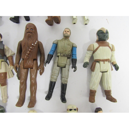 9052 - A group of twenty loose vintage Kenner / Palitoy Star Wars action figures to include Han Solo in Hot... 